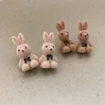 cuterabbitearringskoreanstylecartoonplushrabbitbowearringsforwomengirls1pairrandomcolor 5 Shopwido Pakistan